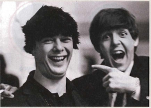 Brian Epstein in a Beatle wig (with Paul)